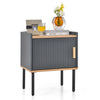 Gray nightstand with a smooth surface, featuring a single door cabinet and adjustable foot pads for stability in small.