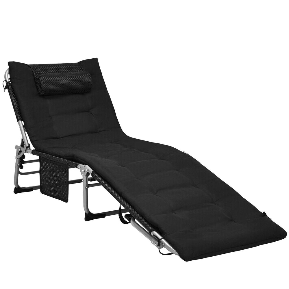 Black 4-fold padded folding lounge chair with removable mattress, perfect for outdoor relaxation by the pool or garden.