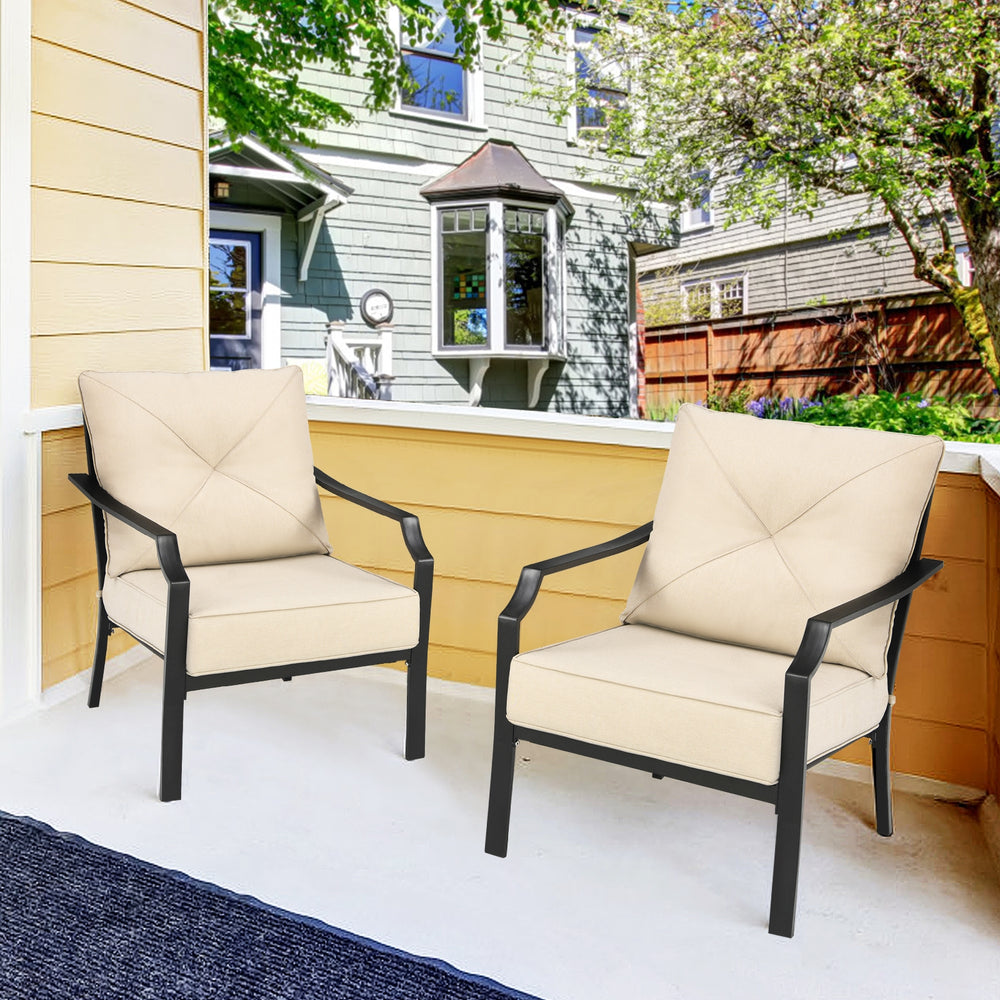 Two patio chairs with padded cushions and armrests, featuring a rustproof steel frame, perfect for outdoor relaxation.