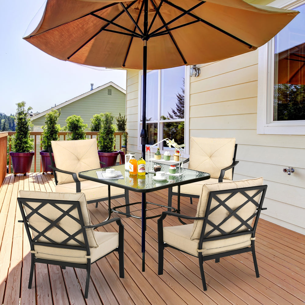 Patio dining set featuring two padded chairs with armrests and a sturdy steel frame, ideal for outdoor relaxation.