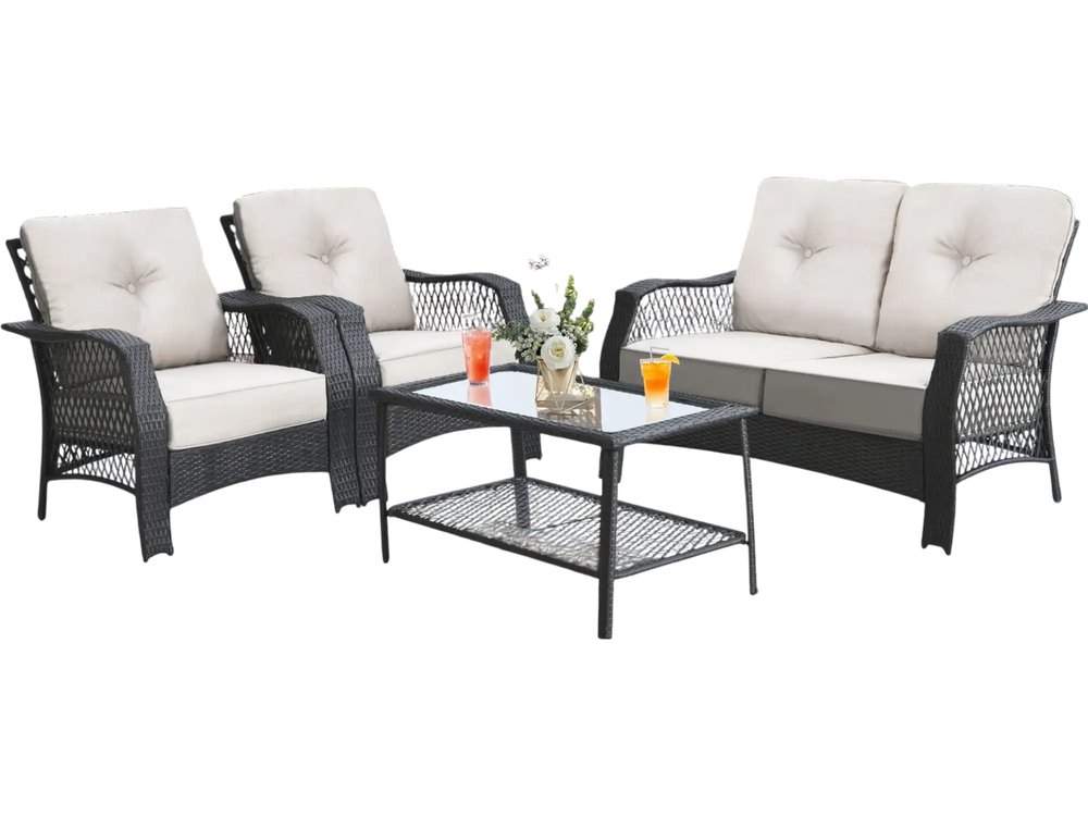 4-piece patio wicker furniture set featuring a loveseat, two chairs, and a coffee table with beige cushions, ideal for.