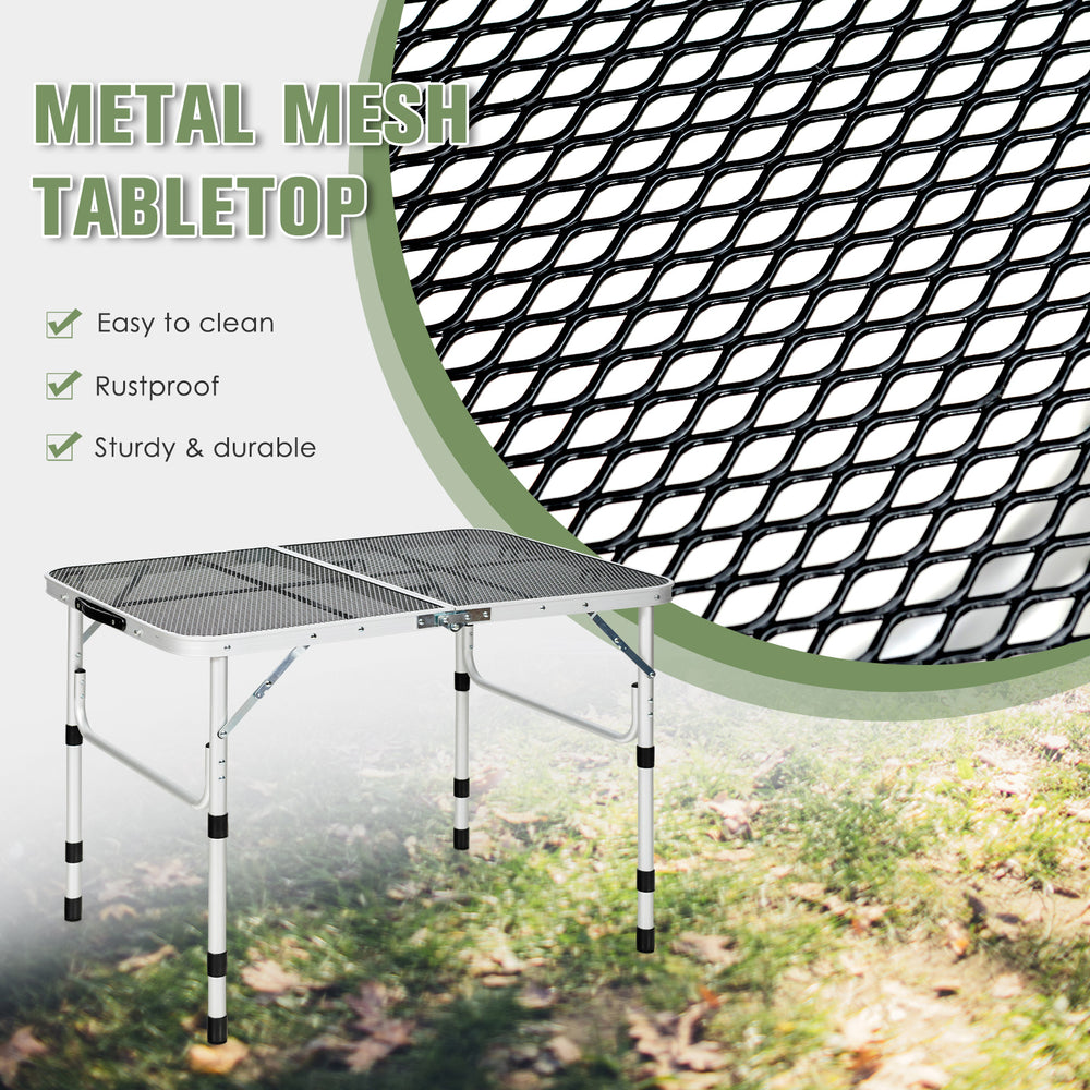 Folding aluminum grill table with iron mesh top, sturdy design, adjustable heights, perfect for outdoor camping and.