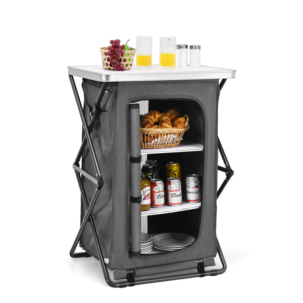 Folding camping storage cabinet with 3 shelves, waterproof oxford cloth, and spacious tabletop for outdoor use.