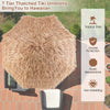 7.2 feet patio thatched tiki umbrella with 7-layer thatch for UV protection, perfect for tropical outdoor settings.
