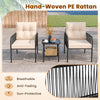 Two beige cushioned chairs with a glass top table, made of hand-woven PE rattan, ideal for outdoor patio use.