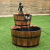 Side view of the 2-Tiers Outdoor Wooden Barrel Waterfall Fountain, showcasing its smooth finish and rustic charm for.