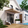 Retractable 10' x 8.2' beige awning with manual crank, installed over a patio for stylish outdoor shading.