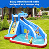 Inflatable water slide park featuring a shark design, climbing wall, and splash pool for kids' summer fun in the.