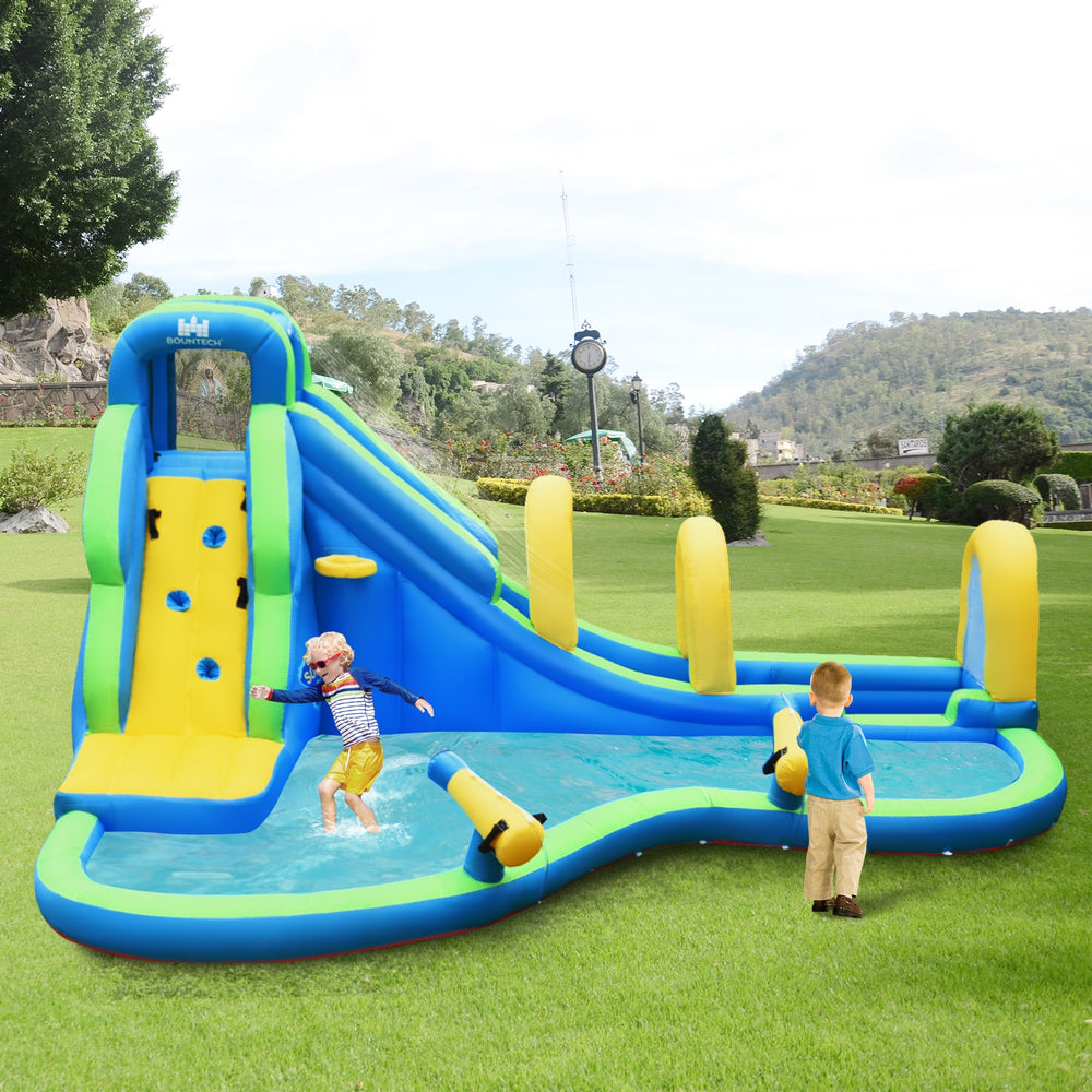 Inflatable water slide with climbing wall, splash pool, and water cannons, designed for kids aged 4-12 years.