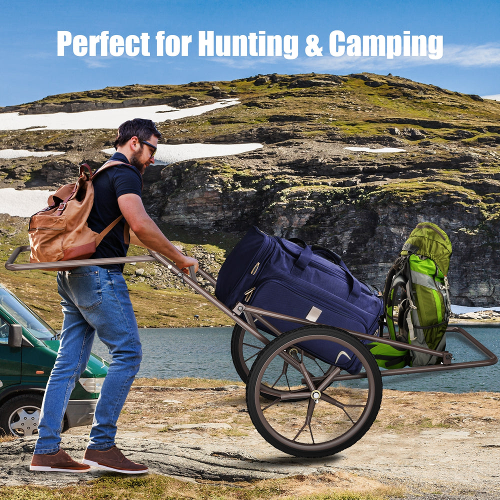 Larger Capacity Folding Deer Game Cart with large 17" wheels, shown transporting gear for hunting and camping.