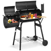 Outdoor BBQ grill with side shelf, durable steel construction, and attached firebox for patio cooking.
