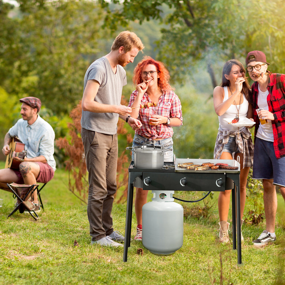 Portable propane 3 burner gas cooker with cast iron head, perfect for outdoor cooking and tailgating.
