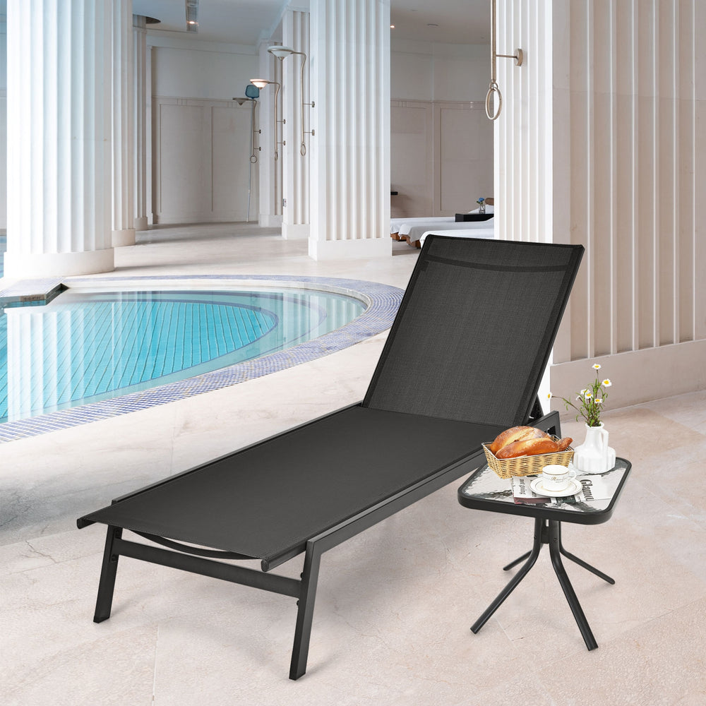 Black outdoor reclining chaise lounge chair with 6 adjustable positions, perfect for poolside relaxation.