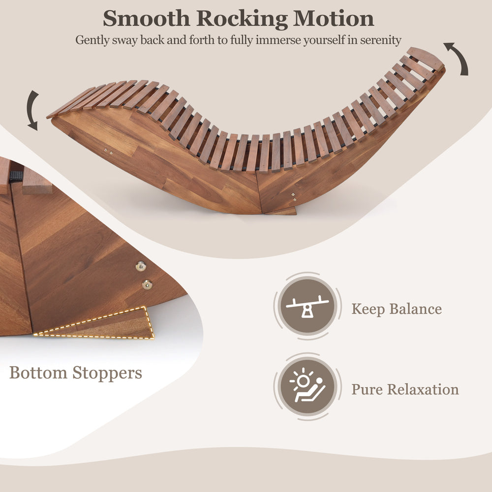 Outdoor acacia wood rocking chair with widened slatted seat, showcasing smooth rocking motion for backyard relaxation.
