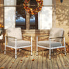 Two patio aluminum sofa chairs with wicker backrest and soft cushions, perfect for backyard or poolside relaxation.