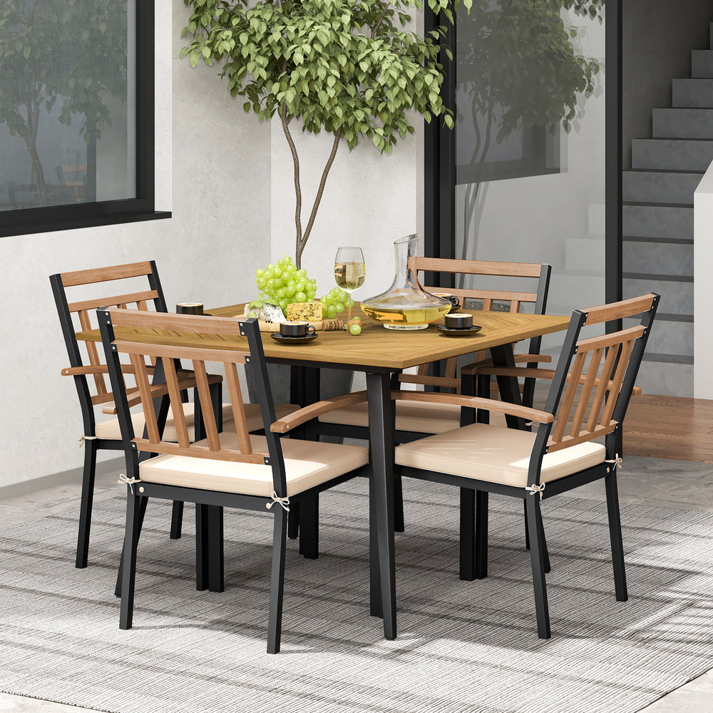 Side view of the 5-piece patio dining set showcasing the sturdy metal frame and soft cushions, ideal for outdoor spaces.