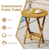 Round teak wood patio folding side table with slatted tabletop, perfect for snacks and drinks on the balcony or porch.