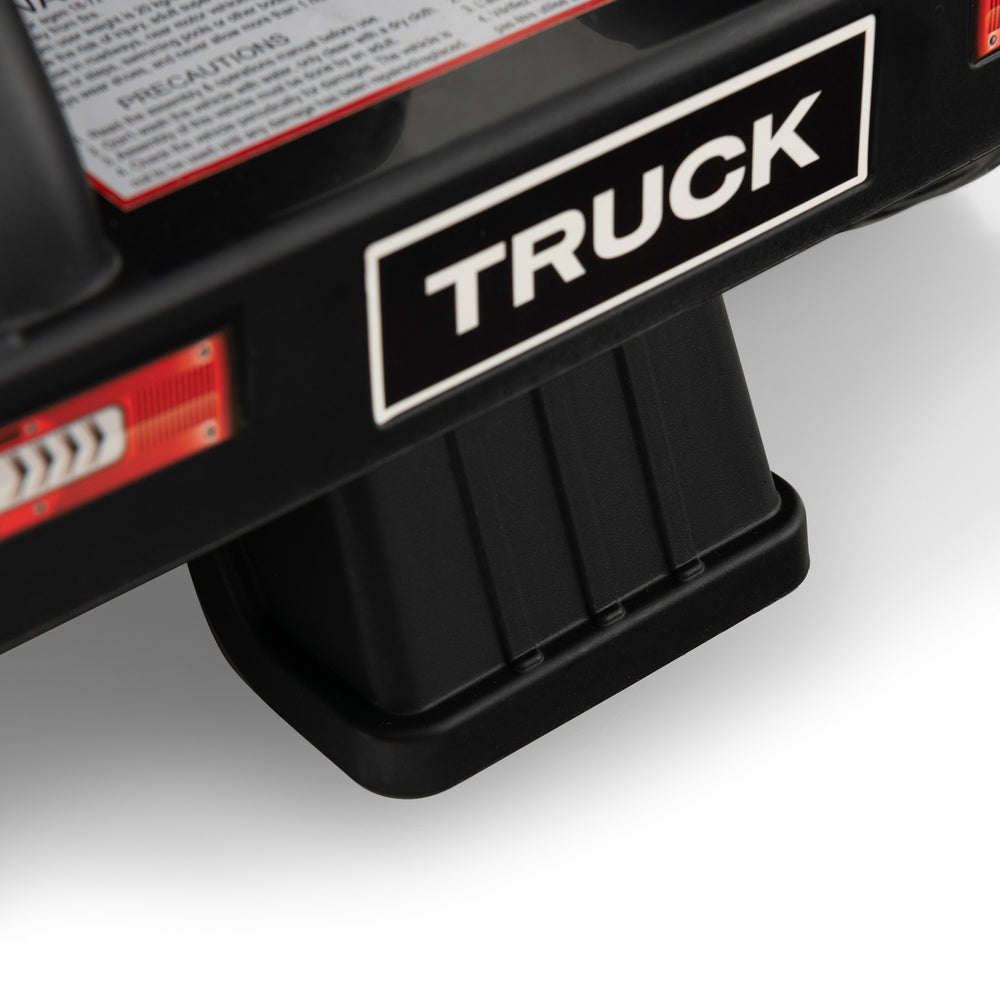 Close-up of the rear of the 6V Kids Electric Ride-on Truck, featuring a sturdy support base and safety features.