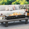 Portable mini fireplace with stainless steel burner and wind guard, perfect for outdoor table settings.