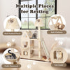 Multi-level cat tree in beige featuring a padded perch, soft platform, and fluffy hammock for playful resting.