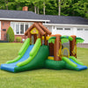 Inflatable jungle bounce house with dual slides, climbing wall, and safety nets, perfect for kids aged 3 to 10.