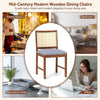 Rattan dining chair with rubber wood frame and linen fabric padded seat, ideal for dining rooms and cozy spaces.