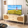 Rattan TV stand with solid wood legs, featuring dual drawers and cabinets, perfect for 65-inch TVs in a stylish living.