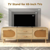 Rattan TV stand for 65-inch TVs with drawers, solid wood legs, and spacious top for stylish living room storage.