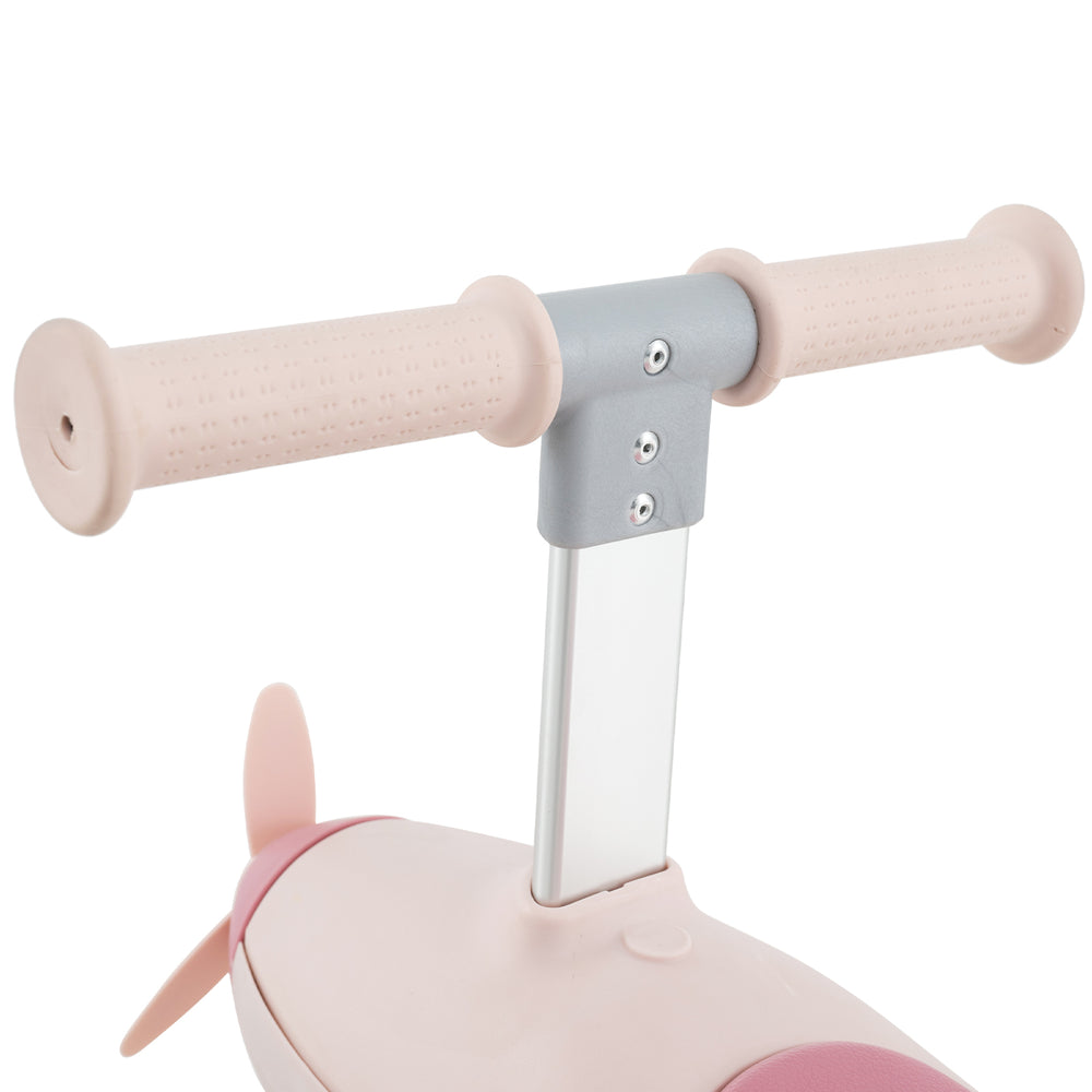 Close-up of the anti-slip handlebars on the pink 2-in-1 kids ride-on push car with LED lighted wheels.