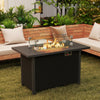Black propane gas fire pit table with wind guard and glass rocks, featuring a removable lid for versatile use.