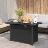 Black propane gas fire pit table with removable lid, wind guard, and elegant rattan surface for outdoor gatherings.