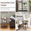 2-tier round end table set with walnut finish and triangular metal frame, ideal for living room or bedroom use.