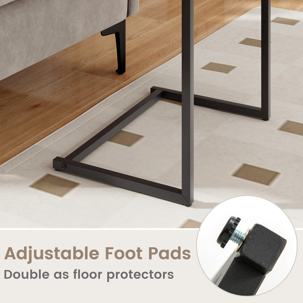 C-shaped industrial end table with adjustable foot pads, featuring a rustic wood grain finish for versatile room use.