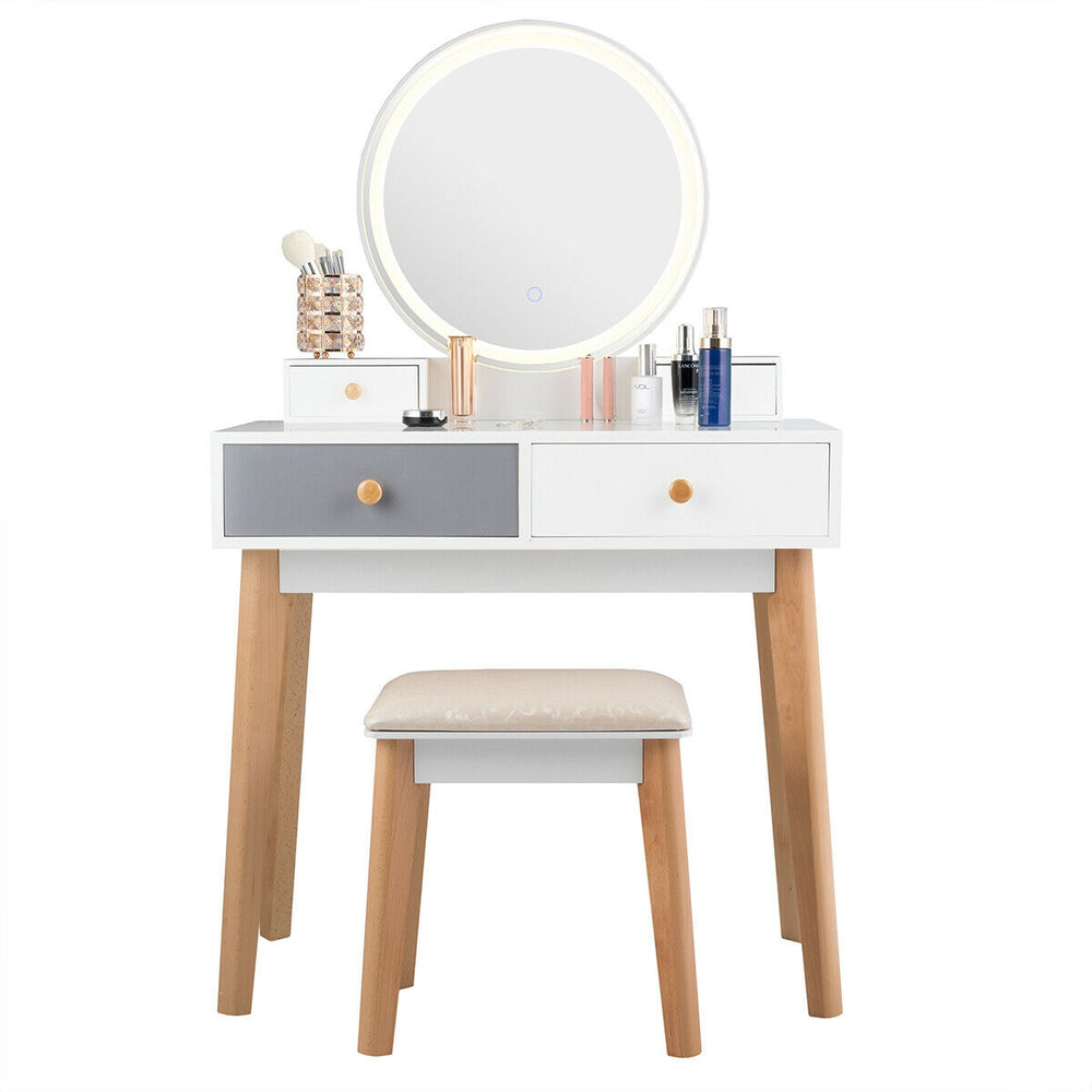 Makeup dressing table with lighted round mirror, four drawers, and solid beech wood legs for elegant bedroom decor.