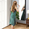Full-length mirror jewelry cabinet with 4 drawers, featuring necklace hooks and earring slots for organized storage.