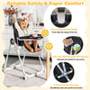 Foldable baby high chair in black with adjustable backrest, removable trays, and 5-point safety harness for secure.