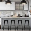 Set of 4 black 30-inch bar stools with square seats and handling holes, perfect for kitchen or home bar use.