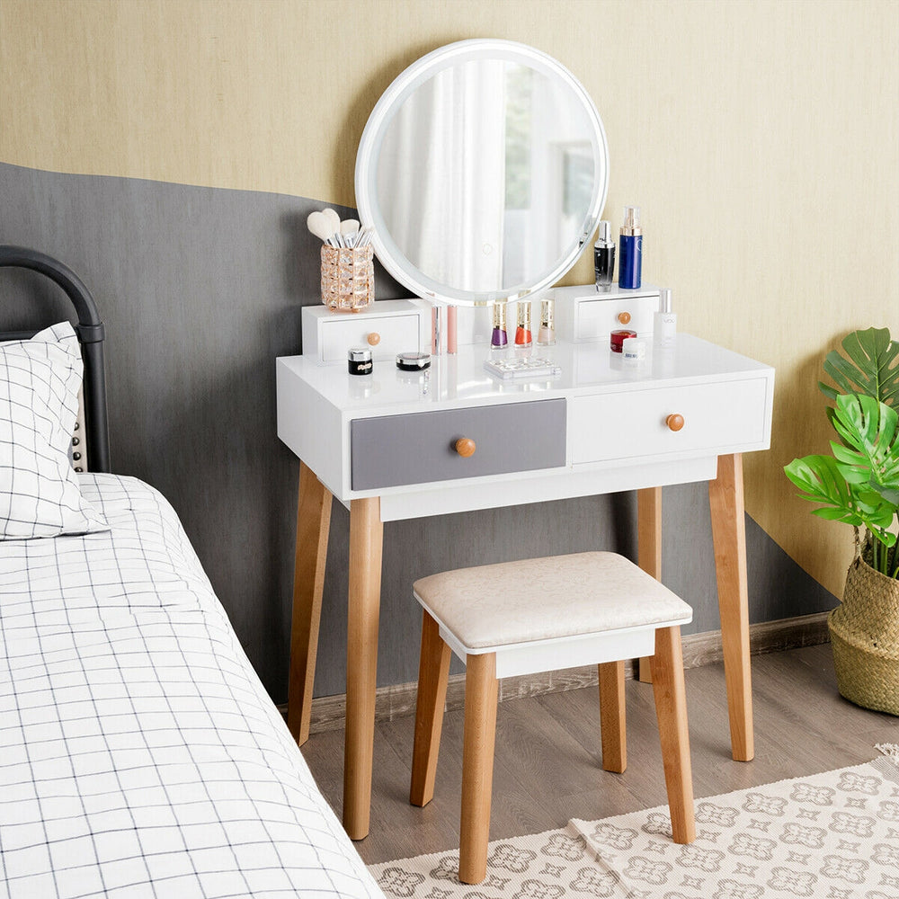 Makeup dressing table with lighted mirror, 4 drawers, and solid beech wood legs, perfect for bedroom or living room use.