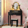 Black vanity table set with 5 drawers, oval mirror, and 12 LED bulbs, perfect for makeup and writing in any room.