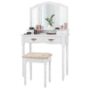 White vanity set with tri-fold mirror, cushioned stool, and four storage drawers for organizing cosmetics.