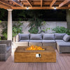 Rectangular 48" outdoor gas fire pit table with lava rocks, 50,000 BTU, set on a patio for cozy gatherings.