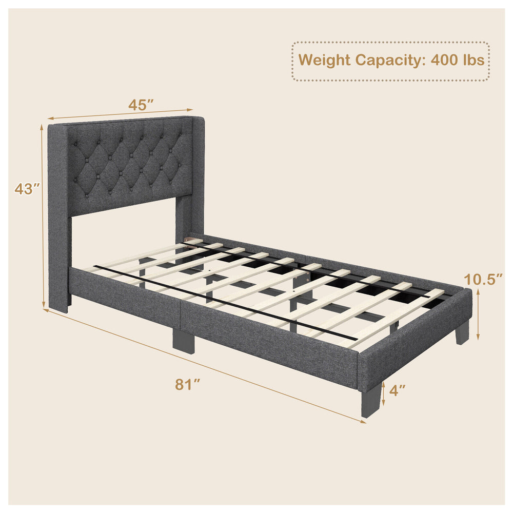 Twin size upholstered platform bed with button tufted headboard, solid wood slats, and adjustable foot pads for.