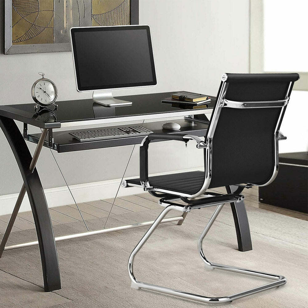 Black PU leather conference chair with ergonomic backrest and sled base, perfect for office or reception areas.