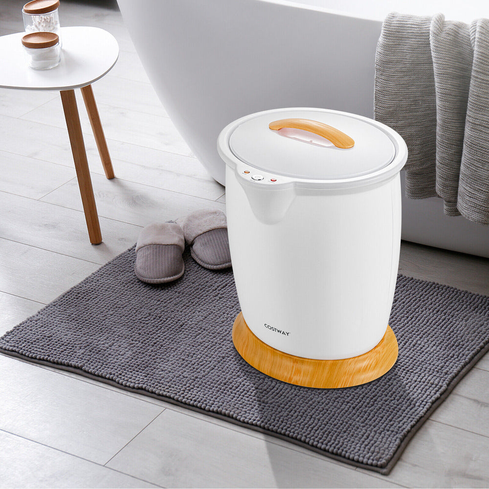 Bathroom towel warmer bucket in white with bamboo base, ideal for warming towels and socks, featuring a fragrance.