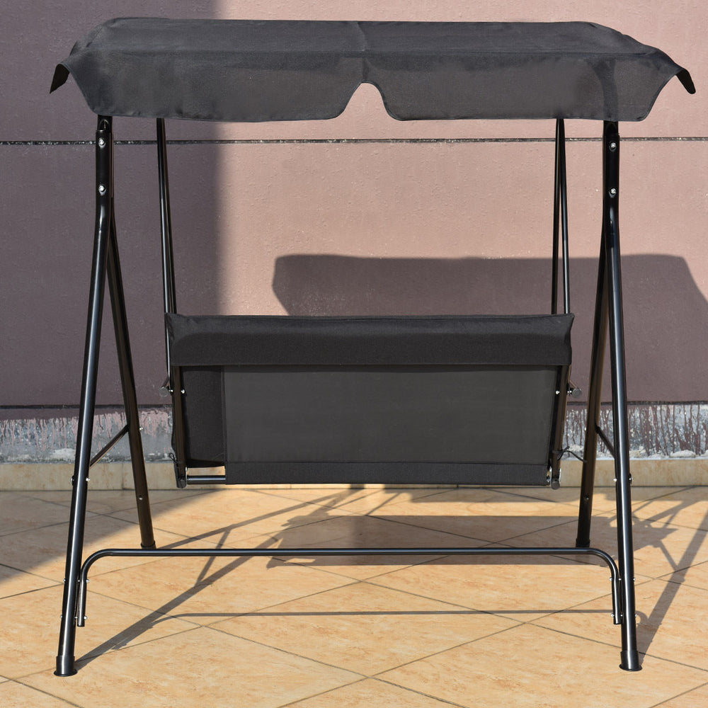 Side view of the loveseat cushioned patio swing glider with black steel frame and waterproof canopy, ideal for outdoor.