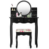 Makeup vanity table set in black with oval mirror, 4 drawers, and cushioned stool, perfect for girls' dressing needs.