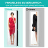 Frameless full-length mirror on a multifunctional black jewelry cabinet with ample storage for cosmetics and.