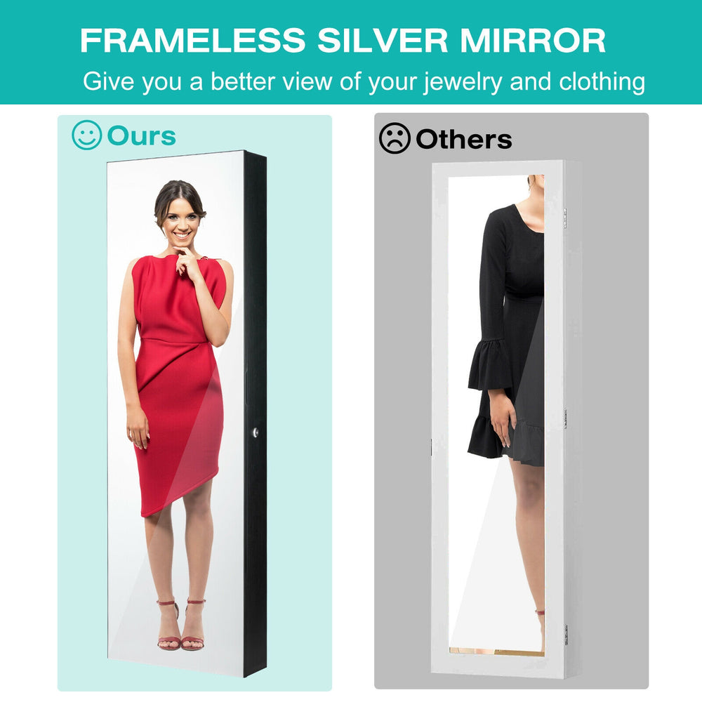 Frameless full-length mirror on a multifunctional black jewelry cabinet with ample storage for cosmetics and.