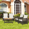 5-piece patio rattan furniture set with cushioned armchairs and acacia wood tabletop, ideal for outdoor relaxation.