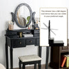 Black vanity table set with oval mirror, 12 LED bulbs, and cushioned stool, perfect for makeup and writing.